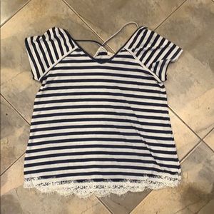 A blue and white striped short sleeve shirt
